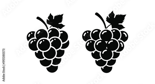 Two bunches of grapes depicted in a stark black silhouette