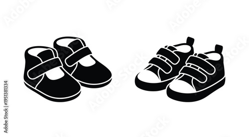 Two pairs of baby shoes are displayed in black a striking silhouette