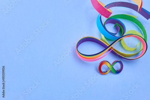 Rainbow infinity symbols representing neurodiversity and autism awareness