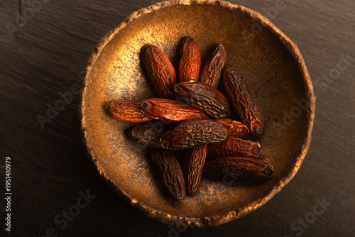 Tonka Beans on Handmade Ceramic Plate