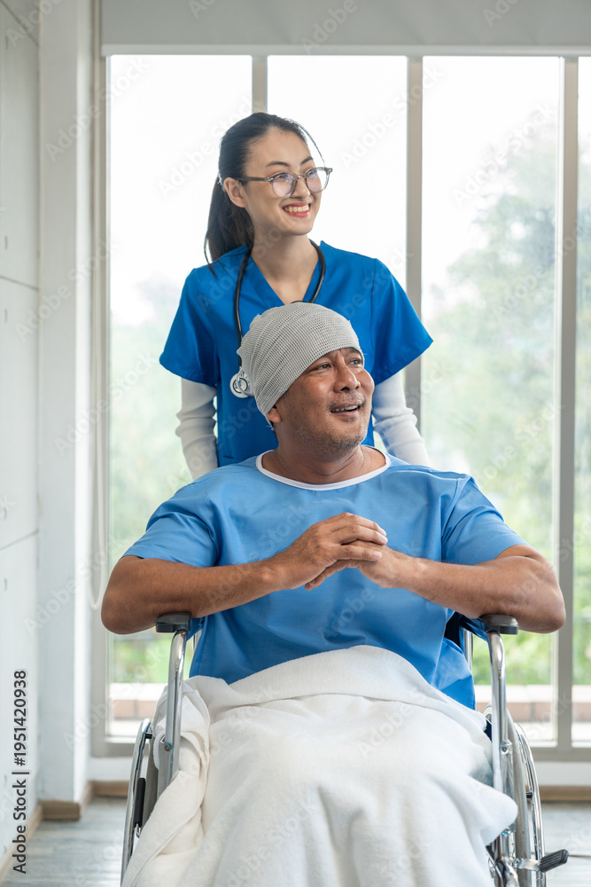Fototapeta premium A male cancer patient in a wheelchair receives IV therapy while a female doctor offers care encouragement and updates on his test results providing support and discussing health progress