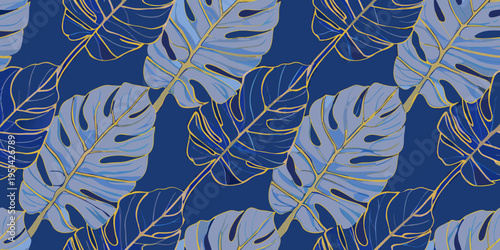 Elegant tropical monstera leaves with golden accents on a blue background