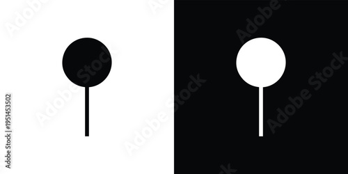 Black and white lollipop on split background candy symbol