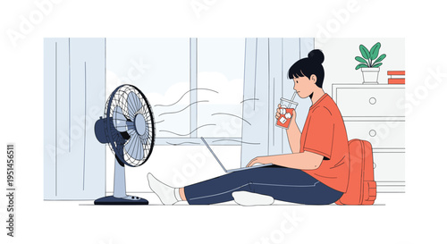 Woman relaxes on the floor with a laptop and cold drink while a desk fan provides a refreshing breeze on a hot day.