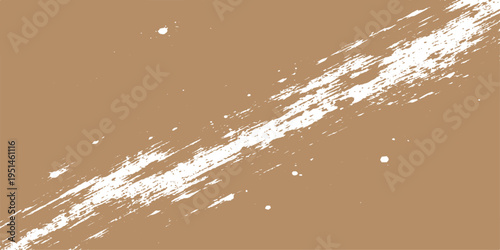 A diagonal streak of white textured paint on a solid earthy brown background with small spatters