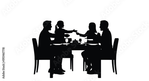 Family enjoying a meal together at a dining table silhouette
