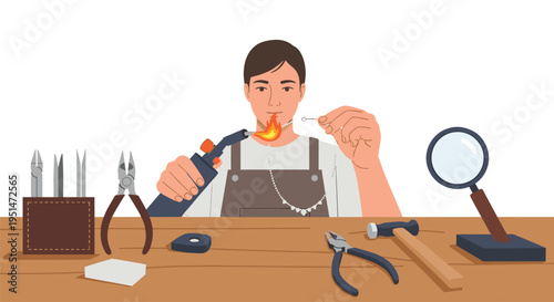 A male jeweler uses a torch to heat a silver necklace at a wooden workbench with various tools.