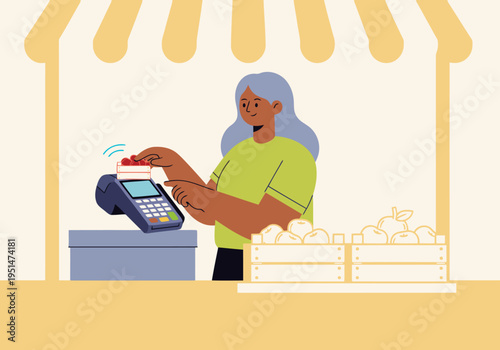 A vendor processes a customer's card payment at a market stall filled with apples. A friendly woman smiles while operating the card reader. Bright, cheerful scene.