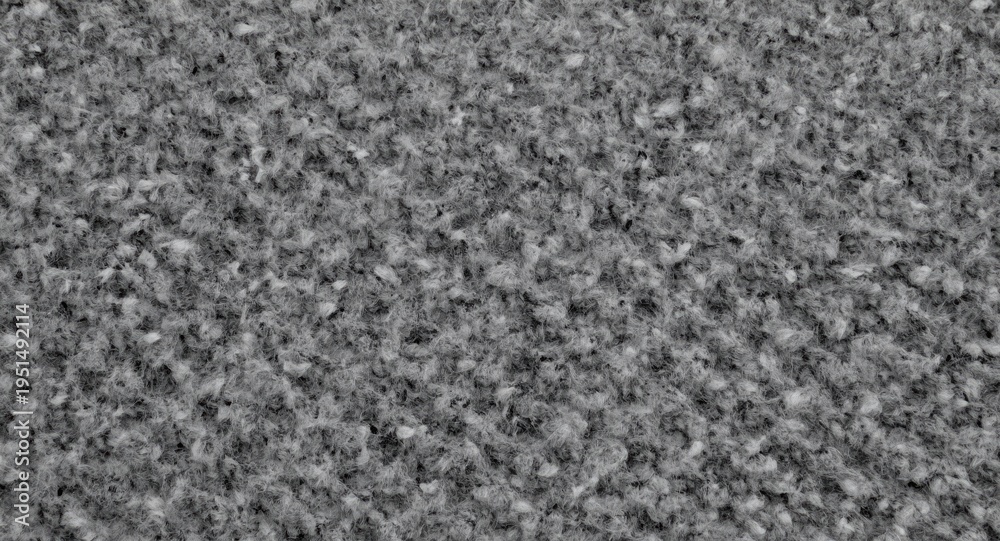 Fototapeta premium Gray knitted material close up highlighting textured weave
