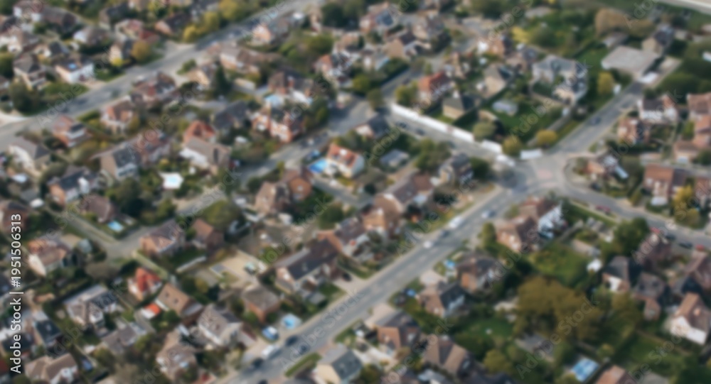 Obraz premium Birds eye view of housing area with tilt shift creating scaled down appearance