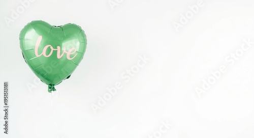 Romantic green balloon floating gently on white backdrop illustrating love declaration