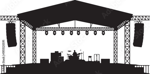 Black silhouette of outdoor stage with speaker towers and drummer