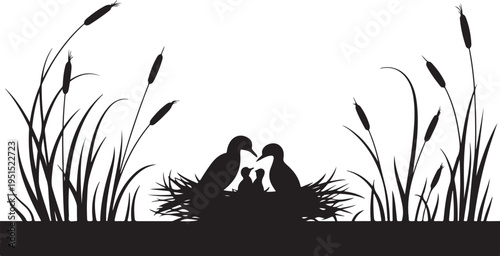 Black silhouette of two birds and two chicks in nest among cattails