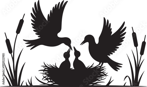 Black silhouette of two birds feeding chicks in nest with cattails