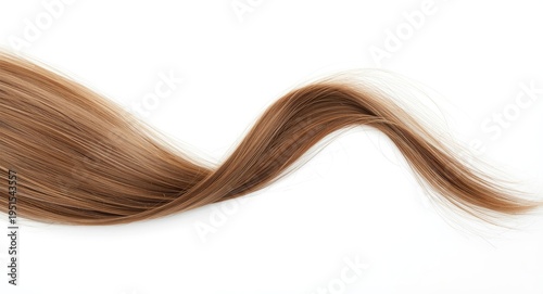 Single thin wave of medium brown hair against white surface