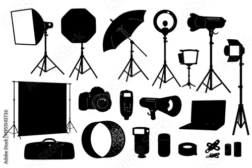Silhouette of photography equipment including lights, cameras, and accessories.