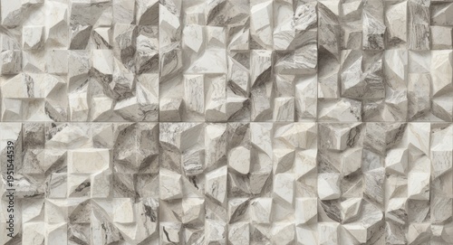Patterned marble wall tiles with three dimensional geometry and textured depth in grey cream palette