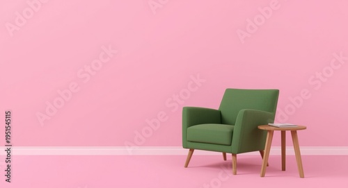 Pink room setting with a green armchair and a wooden side table