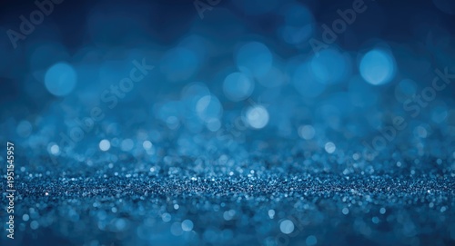 Soft blue bokeh abstract background providing textured surface and ideal text space
