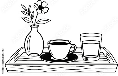A black and white line drawing of a tray with a vase of flowers, a cup of coffee, and a glass