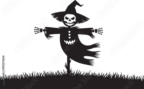 Black scarecrow with skull face and witch hat on grass