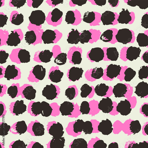 A bold seamless vector pattern of abstract organic spots in black and vibrant pink on a soft cream background