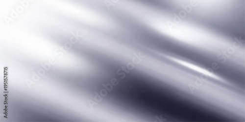 A smooth silver silk and satin fabric texture featuring a brushed metallic steel design with a shiny gray aluminum surface and light grey stainless pattern for a sleek material backdrop