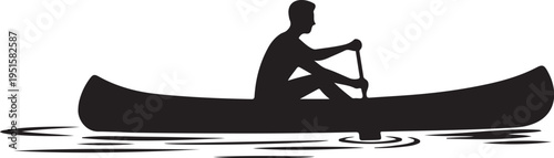 Black silhouette of man rowing canoe on water