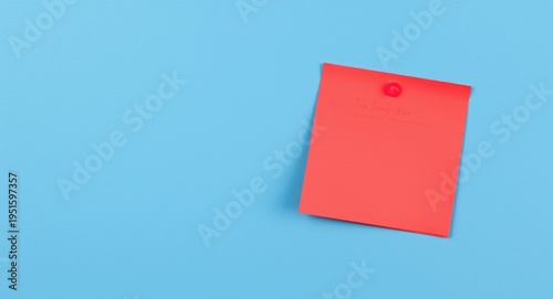 Ruby red sticky note on iso...