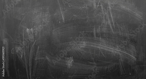 Grey chalk patterns on dark...