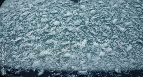 Icy and snowy windshield cl...