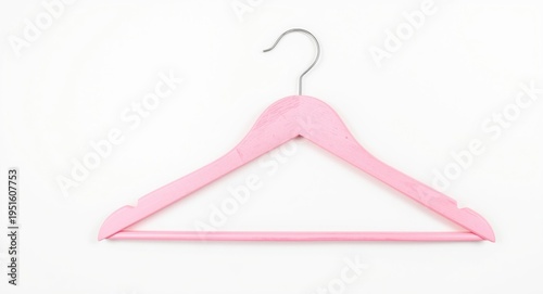 Pink wooden clothing hanger...