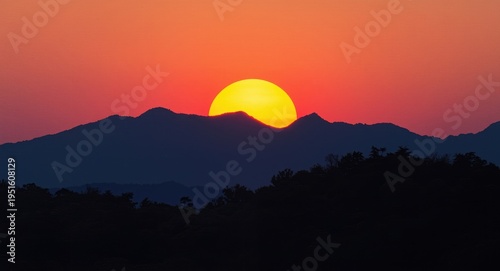 Mountain range silhouette a...