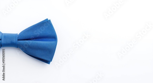 sharp blue bow tie against ...