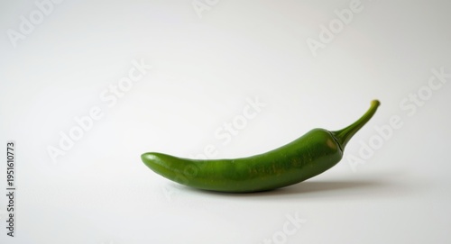 Fresh green chili against a...
