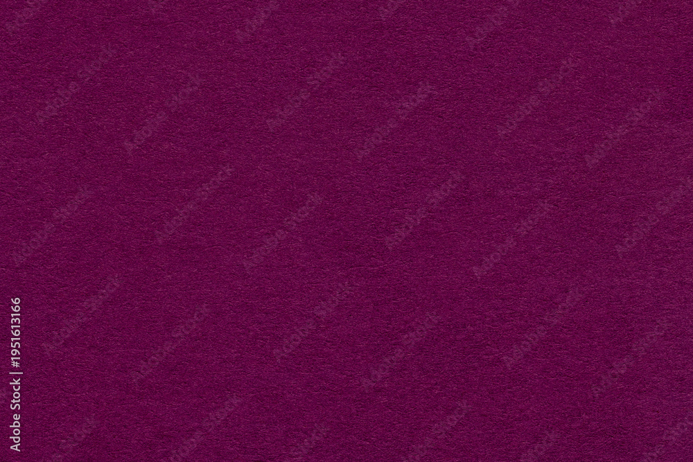Fototapeta premium Dark purple textured paper background with subtle grain surface and soft structure. Burgundy backdrop, macro
