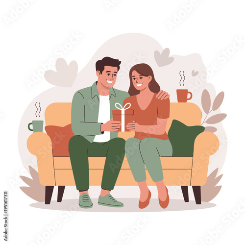 A happy couple sitting on a couch exchanging a gift
