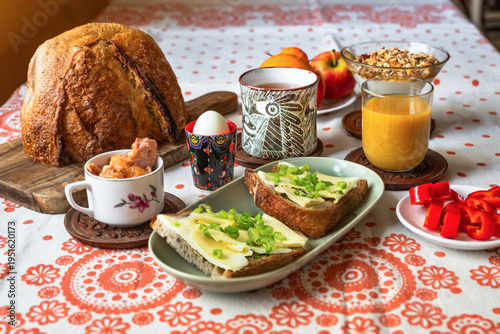 Wallpaper Mural Rich breakfast with bread, beverage,vegetable and fruit, pickled meat, boiled egg and porridge. Torontodigital.ca