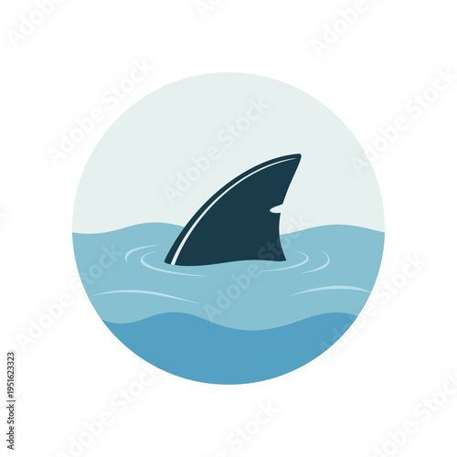 A shark fin protrudes from the ocean water surface