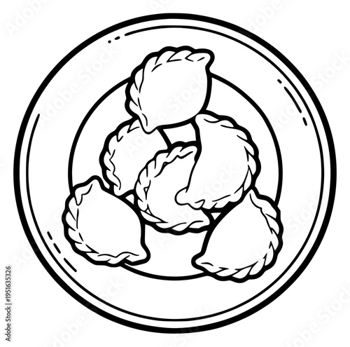 Plate of dumplings / pierogi