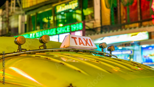 Wallpaper Mural Night scene in Patong Beach, Phuket with taxis, neon lights, and bustling streets Torontodigital.ca