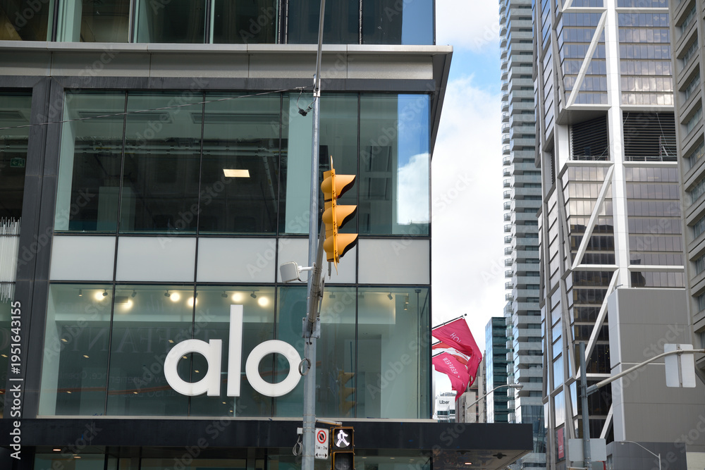 Naklejka premium building facade and sign of ALO, a clothing store, located at 60 Bloor St W, Toronto