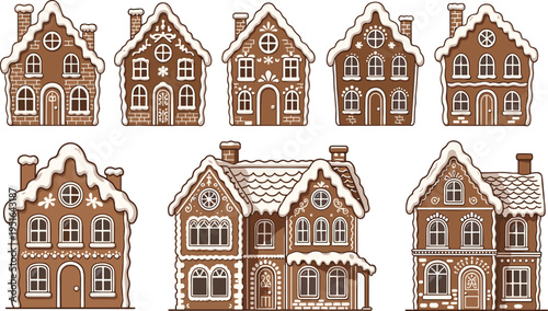 Collection of seven decorated gingerbread houses with white icing snow and brick patterns