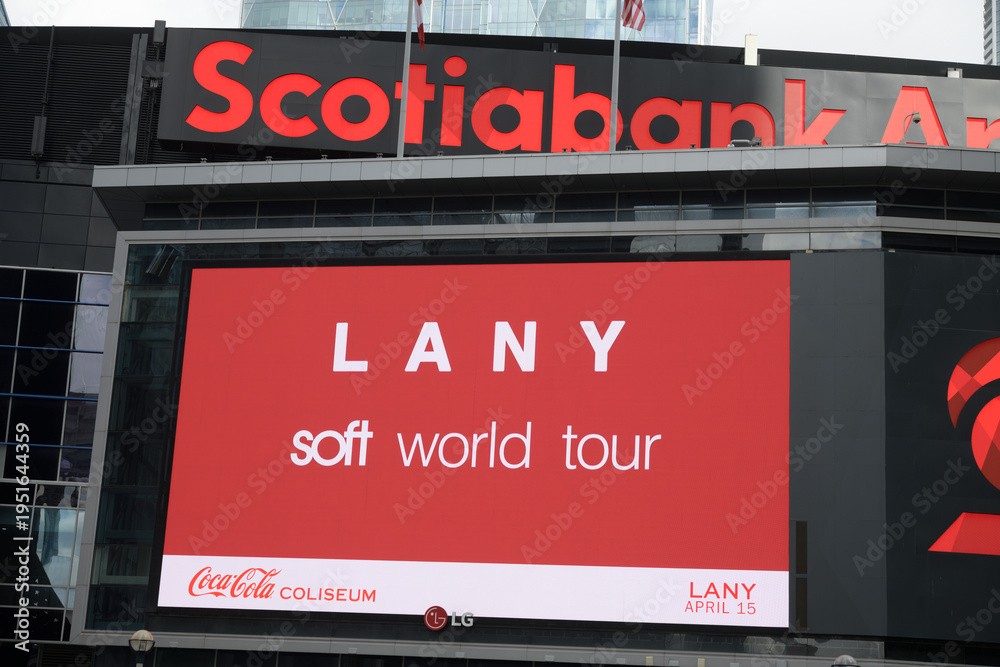 Fototapeta premium digital billboard with concert promotion of LANY soft world tour outside Scotiabank Arena (Maple Leaf Square entrance), Toronto