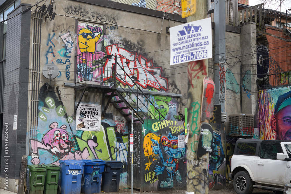 Obraz premium defocused poster on utility pole near Graffiti Alley Toronto