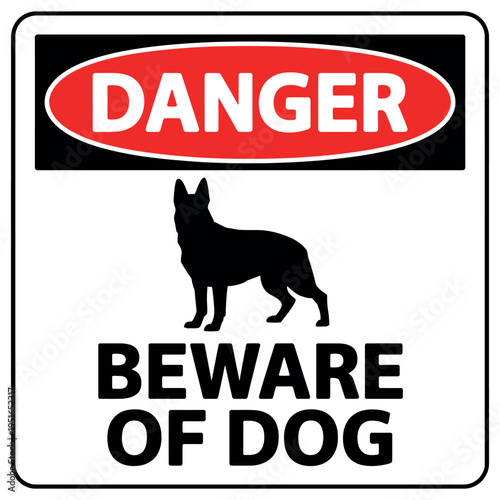 A warning sign with a silhouette of a dog and danger alert