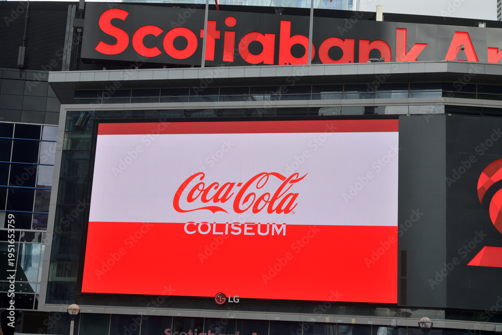Fototapeta premium LED sign outside Scotiabank Arena (Maple Leaf Square entrance) featuring ad for Coca-Cola Coliseum, Toronto