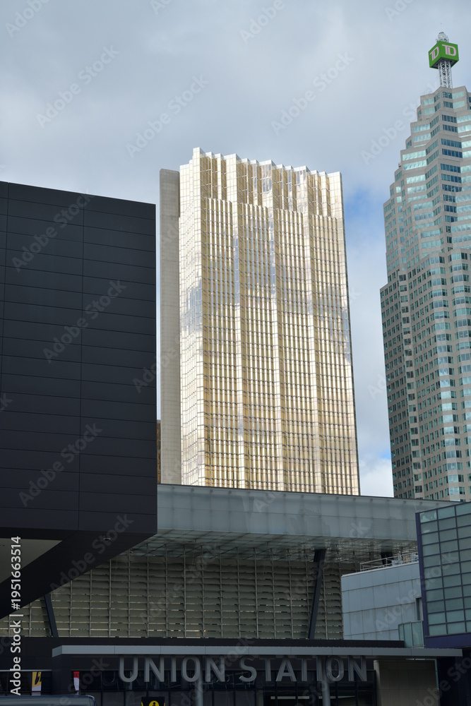 Fototapeta premium Union Station entrance (from Maple Leaf Square/Bremner Blvd) with view of buildings incl Royal Bank Plaza, South Tower, and TD building at Brookfield Place, Toronto