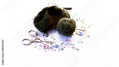 cozy knitting hobby with yarn needles and colorful clips