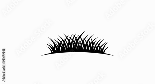 Black silhouette of a patch of grass on a white background